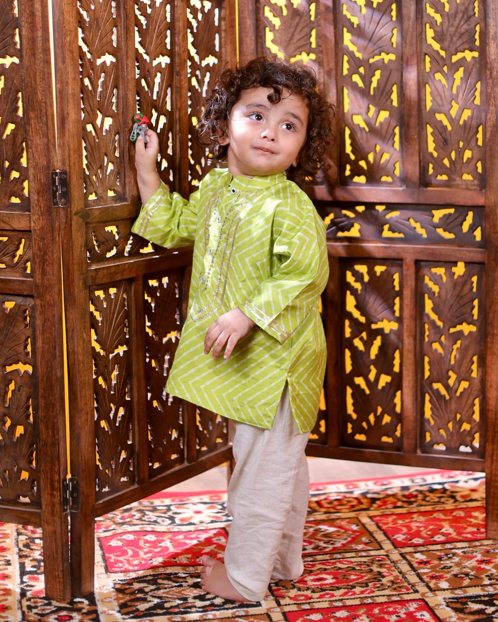 Close view of the lime kurta's gota placket